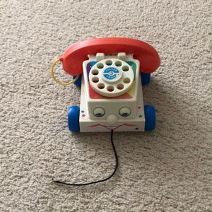 Fischer price replica restrooms phone.